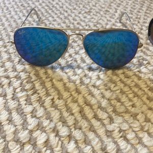 Ray Ban Sunglasses- never worn. Comes with the ray ban case & cleaning cloth